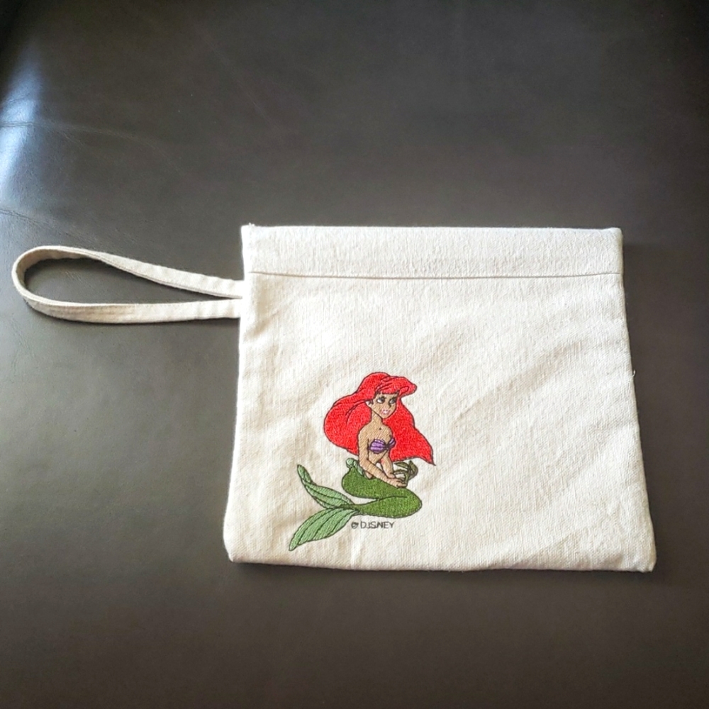 Disneys The Little Mermaid Canvas Wristlet with Magnetic Closure